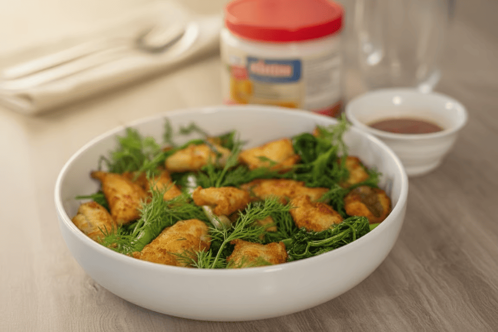 Cha Ca is a famous Hanoi dish featuring grilled turmeric-marinated fish with fresh dill